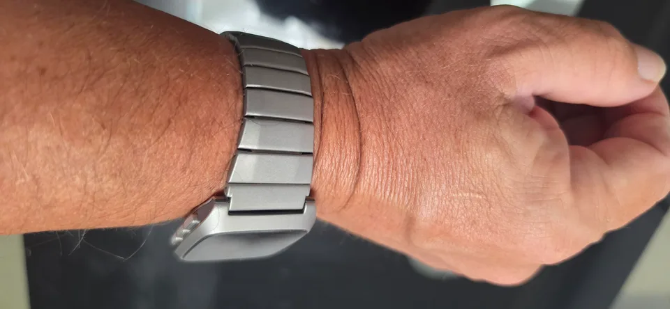 Pebble Time 2 on a stainless steel bracelet worn on the wrist